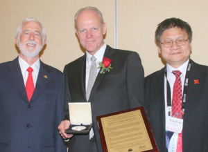 San Diego, October 29, 2014: LIA Executive Director Peter Baker, 2014-Schawlow Awardee Reinhart Poprawe and 2014 Past  LIA President Yongfeng Lu.