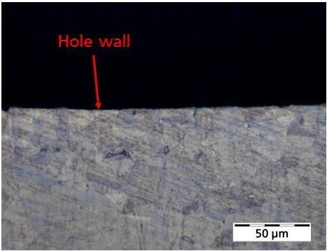 Figure 8. Close-up view of the hole wall of Figure 7 without any recast layer or micro cracks