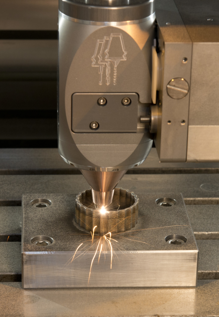 Featuring the nozzle © Hybrid Manufacturing Technologies